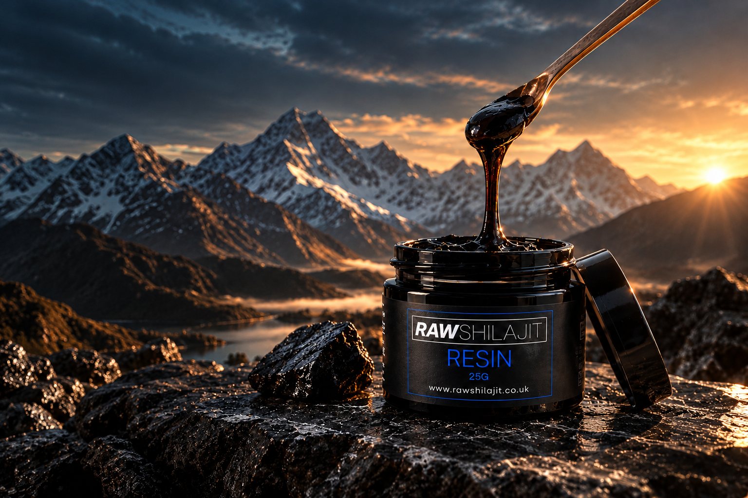 RAW Shilajit resin dripping from a spoon into an open jar on wet rock, Himalayan peaks at sunrise